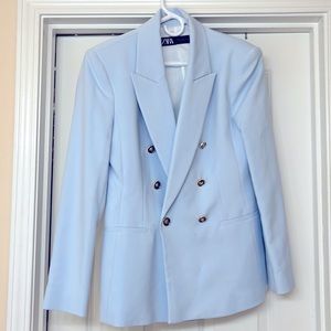 Zara, light blue blazer. Gold buttons. Minimal shoulder pads and light lining.
